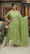 Zeravelle Pista Green Embroidered Mul Crepe Churidar Set